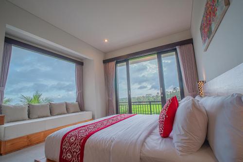 Ένα ή περισσότερα κρεβάτια σε δωμάτιο στο Mahadewi Sunset Villa