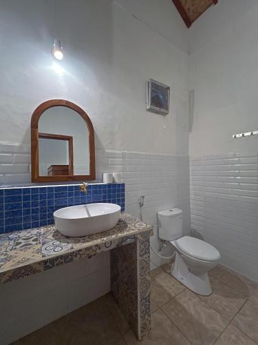 Ein Badezimmer in der Unterkunft Bae Gili Inn