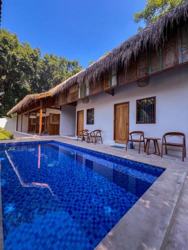 Der Swimmingpool an oder in der Nähe von Bae Gili Inn