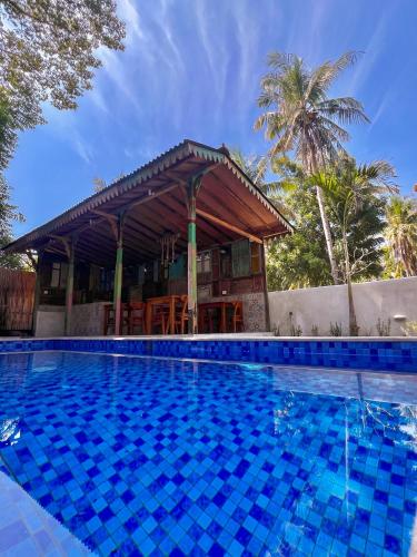 Der Swimmingpool an oder in der Nähe von Bae Gili Inn