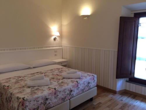 Postel nebo postele na pokoji v ubytování Adelaide House
