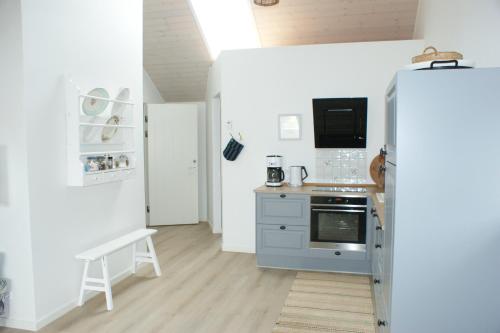 Dapur atau dapur kecil di Lustrup Farmhouse