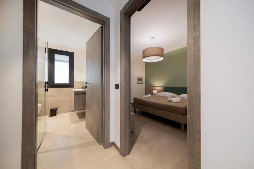 Letto o letti in una camera di ApartmentsGarda - Residenza Garda Deluxe