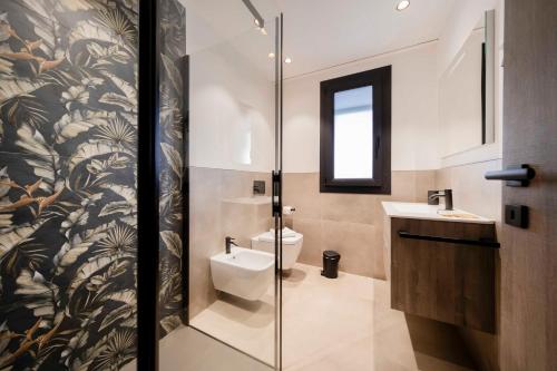 Bagno di ApartmentsGarda - Residenza Garda Deluxe