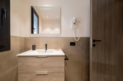 Bagno di ApartmentsGarda - Residenza Garda Deluxe