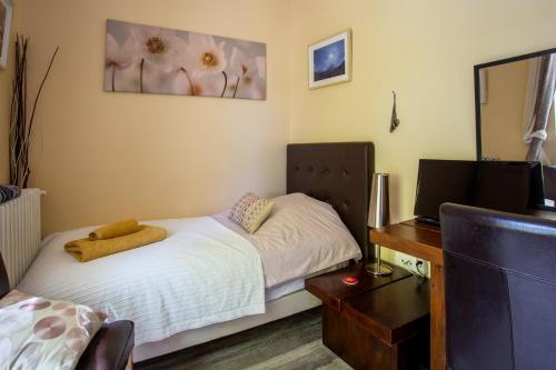 Postel nebo postele na pokoji v ubytování Gites du Caylar - Chambres et Appartments