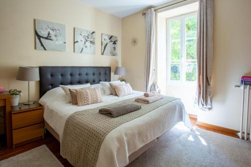 Postel nebo postele na pokoji v ubytování Gites du Caylar - Chambres et Appartments