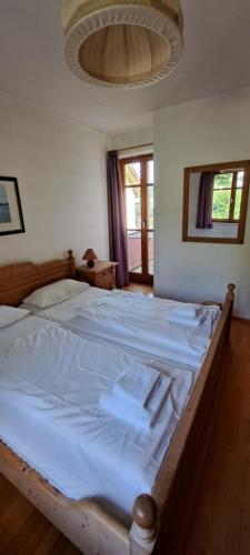 Katil atau katil-katil dalam bilik di Osserapartment