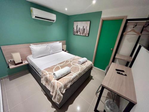 Cama o camas de una habitación en Hotel Sol Caribe Cartagena