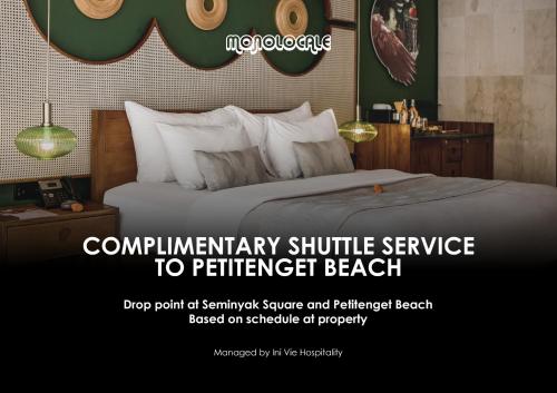 a poster of a bed in a hotel room at Monolocale Resort Seminyak by Ini Vie Hospitality in Kerobokan