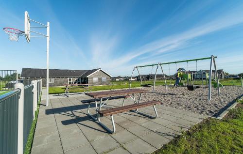 a park with a picnic table and a hoop at Gorgeous Home In Bogense With Sauna in Bogense
