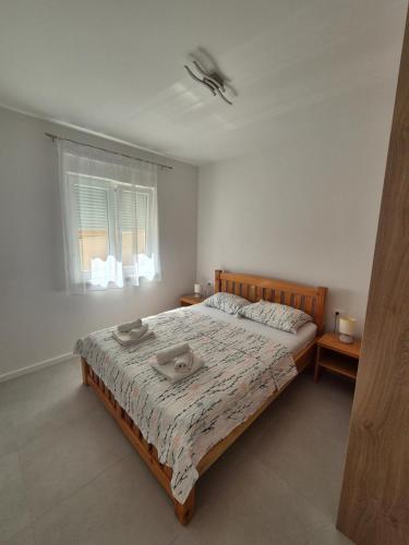 Postel nebo postele na pokoji v ubytování Apartment Nikol Orebić