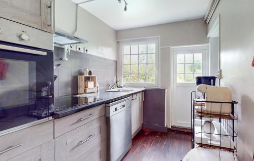 a kitchen with a sink and a counter top at Beautiful Home In Vittefleur With Wifi in Vittefleur