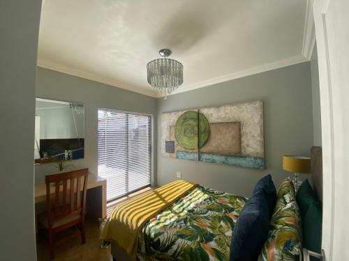 Ένα ή περισσότερα κρεβάτια σε δωμάτιο στο Bel Air 2