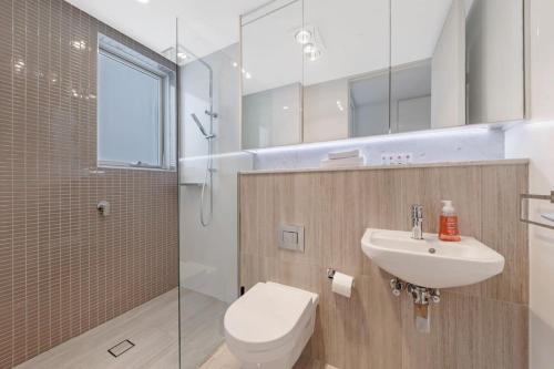 Ένα μπάνιο στο Aircabin｜Beecroft｜Cozy Spacious｜2 Beds Apt+Parking