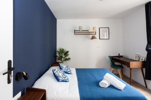 Postel nebo postele na pokoji v ubytování Maison Geranium