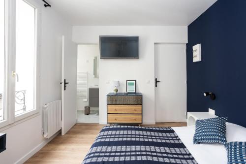 Postel nebo postele na pokoji v ubytování Maison Geranium
