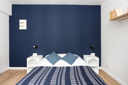 Postel nebo postele na pokoji v ubytování Maison Geranium