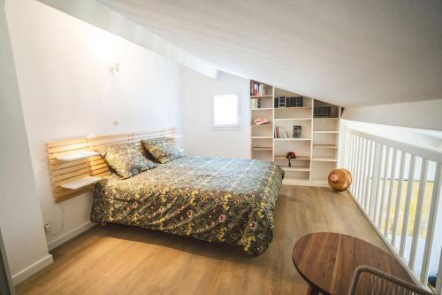 En eller flere senge i et værelse på Maison L oree du Golf