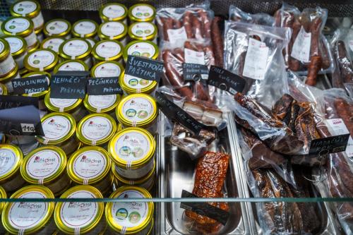 a display in a grocery store filled with lots of food at Ubytování Kroupa in Dolní Dunajovice