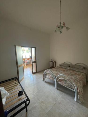 Ένα ή περισσότερα κρεβάτια σε δωμάτιο στο Villetta Al Mare