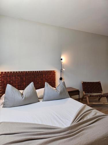 Postel nebo postele na pokoji v ubytování Limens Luxury Apartment