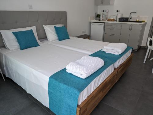 Кровать или кровати в номере Memory Apartments
