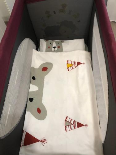 a bed with three hello kitty pillows in a box at Studio Stipe- with free parking, self check-in 0-24 in Zagreb