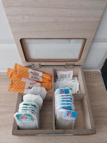 a box filled with different types of food at Apartamento grande en Huesca in Huesca