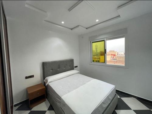 Postel nebo postele na pokoji v ubytování Dina Apartments