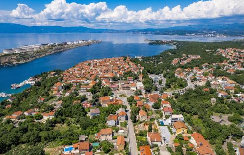 an aerial view of a town next to a lake at Amazing Apartment In Omisalj in Omišalj