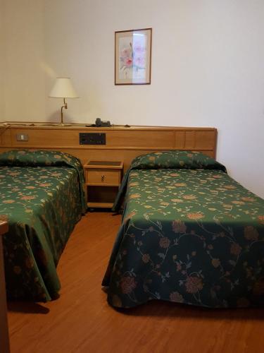 Hotel and Wellness Patriarcaにあるベッド