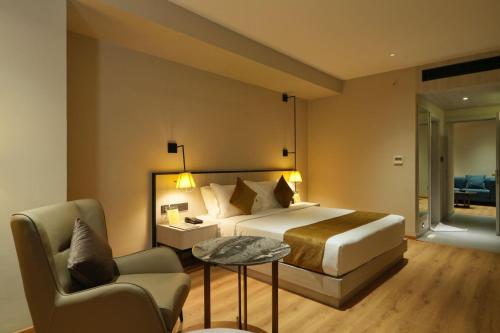 Una cama o camas en una habitación de mesta Hotel