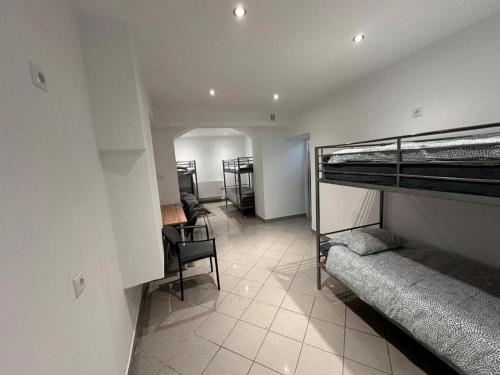 Postel nebo postele na pokoji v ubytování Gołębia Hostel