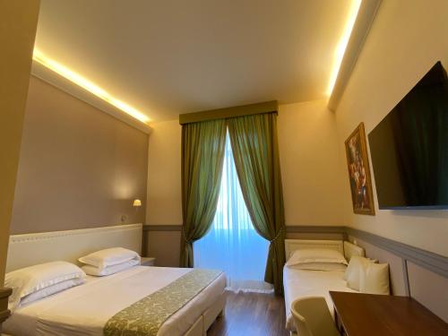 Basilica Hotelにあるベッド