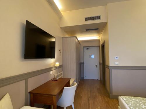 Basilica Hotelにあるテレビまたはエンターテインメントセンター