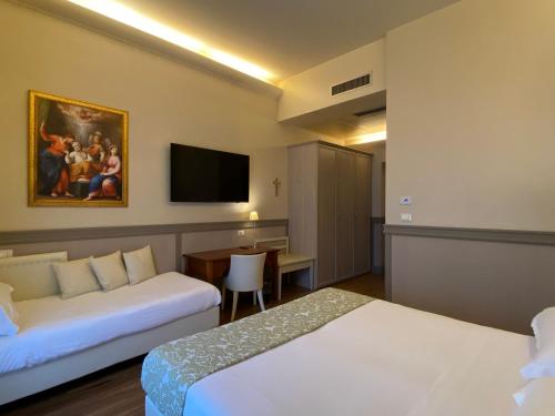 Basilica Hotelにあるベッド