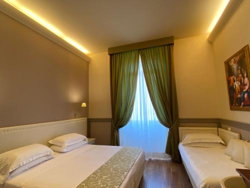 Basilica Hotelにあるベッド