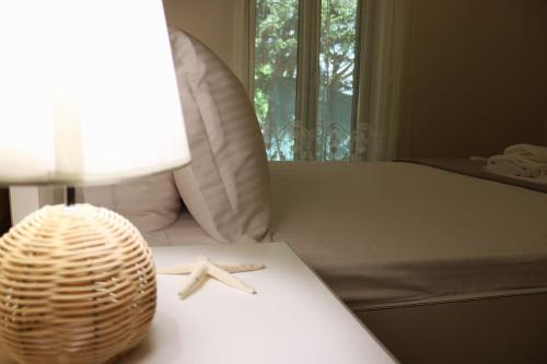 Ένα ή περισσότερα κρεβάτια σε δωμάτιο στο Arriva Villas