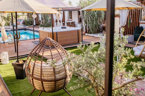 a backyard with a hammock and a pool at Morena in Ulcinj