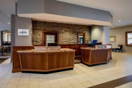 a lobby of a hospital with two reception desks at Residence Inn by Marriott Kingston Water's Edge in Kingston