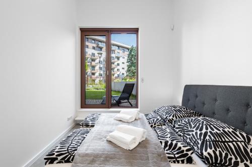 Posteľ alebo postele v izbe v ubytovaní Modern Oasis in Bratislava's Heaven