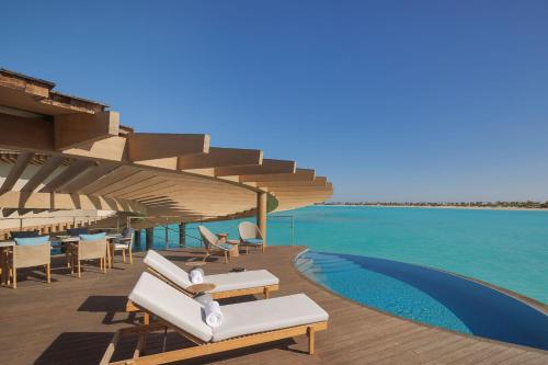 a resort with a view of the water at The St. Regis Red Sea Resort in Ḩanak