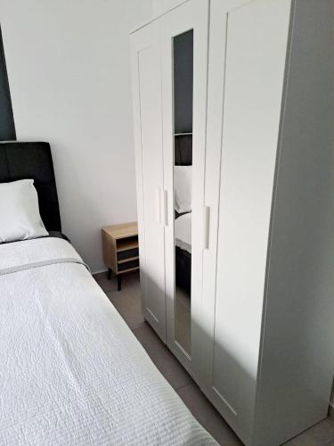 Ένα ή περισσότερα κρεβάτια σε δωμάτιο στο Dimitra`s Apartments Igoumenitsa