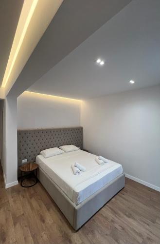 Ένα ή περισσότερα κρεβάτια σε δωμάτιο στο Hotel Andrea