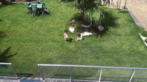 Κήπος έξω από το Palmiyem Apart Otel