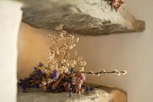 a vase filled with flowers on a table at Panoramic Views & Spacious Living by LetMeStay in Grasmere