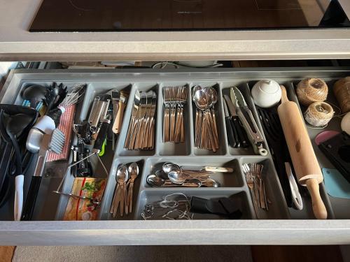 a drawer filled with lots of utensils at Chalet Theresa in Bad Sankt Leonhard im Lavanttal