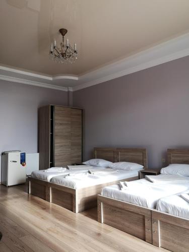 Ein Bett oder Betten in einem Zimmer der Unterkunft FRESH Hotel Kobuleti