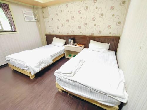 Katil atau katil-katil dalam bilik di Kaixiang Homestay